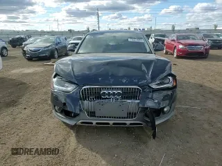 2014 Audi allroad Premium Plus with VIN WA1UFAFL0EA131822, listed as a Copart auction lot 76324684 with 73,048 mi miles and Salvage Title. Bid and sale history available at carsss.com. Image 11.