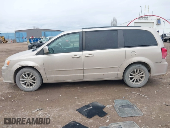 2014 Dodge Grand Caravan SXT z VIN 2C4RDGCG8ER253786, wystawiony jako IAAI lot #41771226 z przebiegiem 175 507 mil mil oraz . Historia ofert i sprzedaży dostępna na DreamBid. Obrazek 14.