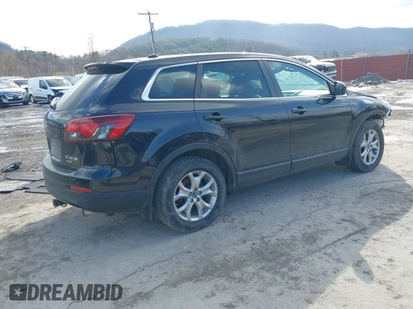 2014 Mazda CX-9 Touring with VIN JM3TB3CV5E0446563, listed as a IAAI auction lot 41524521 with 99,374 mi miles. Bid and sale history available at carsss.com. Image 4.