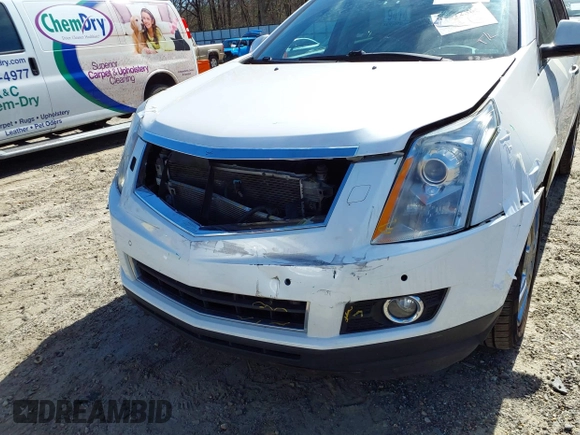 2012 Cadillac SRX Performance Collection with VIN 3GYFNBE33CS614655, listed as a IAAI auction lot 41818918 with 176,899 mi miles. Bid and sale history available at carsss.com. Image 6.