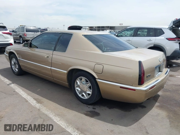 1999 Cadillac Eldorado ESC z VIN 1G6EL12Y5XU603764, wystawiony jako IAAI lot #42368692 z przebiegiem 154 613 mil mil oraz . Historia ofert i sprzedaży dostępna na DreamBid. Obrazek 3.