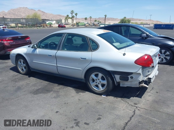 2003 Ford Taurus SE Standard with VIN 1FAFP53UX3G268265, listed as a IAAI auction lot 42090151 with 139,734 mi miles. Bid and sale history available at carsss.com. Image 3.