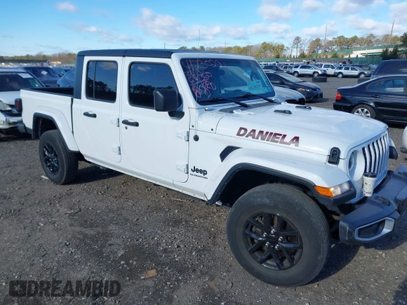 2022 Jeep Gladiator Willys with VIN 1C6HJTAG1NL117631, listed as a IAAI auction lot 41230291 with 33,463 mi miles and . Bid and sale history available at DreamBid. Image 1.
