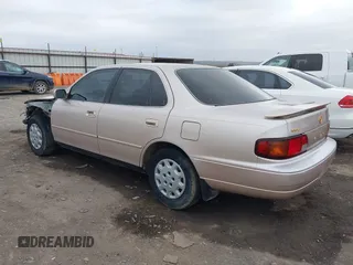 1996 Toyota Camry DX with VIN 4T1BG12K8TU738565, listed as a IAAI auction lot 41702096 with 100,587 mi miles. Bid and sale history available at carsss.com. Image 3.