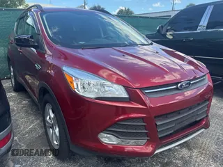 2014 Ford Escape SE with VIN 1FMCU9GXXEUB75330, listed as a Copart auction lot 62310025 with 119,858 mi miles and Clean title. Bid and sale history available at DreamBid. Image 1.