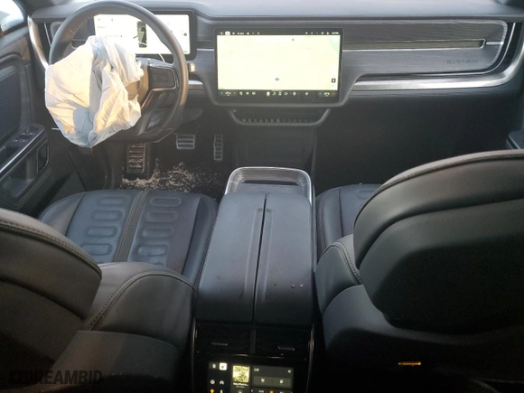 2023 Rivian R1S Adventure with VIN 7PDSGABAXPN008547, listed as a Copart auction lot 89061955 with 24,454 mi miles and Salvage Title. Bid and sale history available at carsss.com. Image 8.
