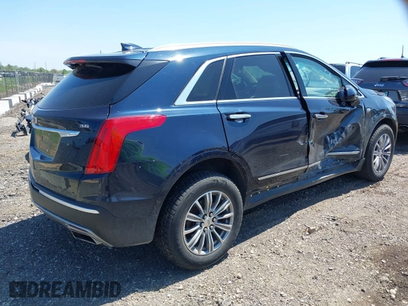 2017 Cadillac XT5 Luxury FWD with VIN 1GYKNBRS2HZ134259, listed as a IAAI auction lot 39416446 with 87,917 mi miles. Bid and sale history available at carsss.com. Image 4.