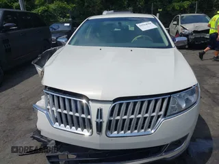 2012 Lincoln MKZ with VIN 3LNHL2GC1CR814101, listed as a IAAI auction lot 42594990 with 156,064 mi miles and . Bid and sale history available at DreamBid. Image 12.