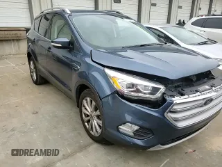 2018 Ford Escape Titanium with VIN 1FMCU9J93JUC01903, listed as a Copart auction lot 57337045 with 59,276 mi miles and Salvage title. Bid and sale history available at DreamBid. Image 14.