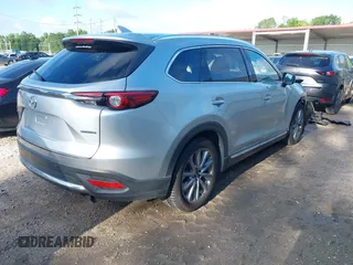 2020 Mazda CX-9 Grand Touring with VIN JM3TCADY2L0406173, listed as a IAAI auction lot 42217230 with 110,465 mi miles and . Bid and sale history available at DreamBid. Image 4.