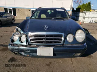 1999 Mercedes-Benz E-Class with VIN WDBJH82F4XX026758, listed as a Copart auction lot 76740804 with 136,782 mi miles and Salvage Title. Bid and sale history available at carsss.com. Image 5.