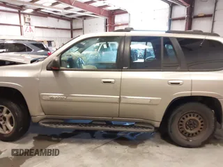 2003 GMC Envoy SLT z VIN 1GKDS13S932299354, wystawiony jako IAAI lot #41238557 z przebiegiem 251 535 mil mil oraz . Historia ofert i sprzedaży dostępna na DreamBid. Obrazek 15.