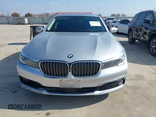 2016 BMW 7 Series 740i with VIN WBA7E2C5XGG739099, listed as a IAAI auction lot 41526038 with 123,900 mi miles. Bid and sale history available at carsss.com. Image 12.