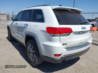 2014 Jeep Grand Cherokee Limited with VIN 1C4RJEBG6EC453833, listed as a IAAI auction lot 41901390 with 148,576 mi miles and . Bid and sale history available at DreamBid. Image 3.