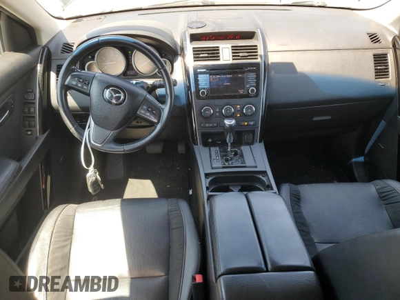 2015 Mazda CX-9 Touring with VIN JM3TB3CV8F0464265, listed as a Copart auction lot 64359885 with 95,980 mi miles and Salvage title. Bid and sale history available at DreamBid. Image 8.