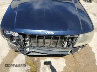 2004 Jeep Grand Cherokee Laredo with VIN 1J4GW48S24C343496, listed as a Copart auction lot 51631915 with 186,216 mi miles and Salvage Title. Bid and sale history available at carsss.com. Image 12.