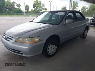 2001 Honda Accord LX with VIN 1HGCG55401A063548, listed as a IAAI auction lot 42651792 with 215,058 mi miles and . Bid and sale history available at DreamBid. Image 2.