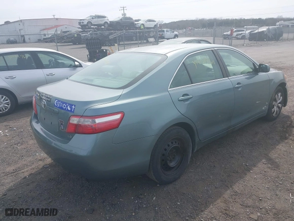 2007 Toyota Camry CE with VIN 4T1BE46K07U536021, listed as a IAAI auction lot 41831968 with 156,381 mi miles. Bid and sale history available at carsss.com. Image 4.