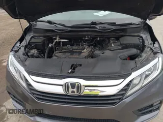 2018 Honda Odyssey EX-L with VIN 5FNRL6H72JB076597, listed as a IAAI auction lot 41838664 with 154,647 mi miles and . Bid and sale history available at DreamBid. Image 10.