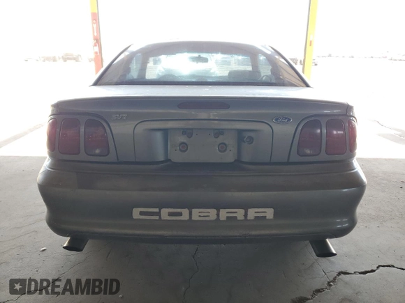 1997 Ford Mustang Cobra with VIN 1FALP47V8VF103811, listed as a Copart auction lot 56455324 with 129,499 mi miles and Salvage Title. Bid and sale history available at carsss.com. Image 6.