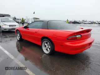 1999 Chevrolet Camaro Z28 z VIN 2G1FP22G2X2112215, wystawiony jako IAAI lot #41459474 z przebiegiem 106 832 mil mil oraz . Historia ofert i sprzedaży dostępna na DreamBid. Obrazek 3.