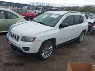 2015 Jeep Compass Sport with VIN 1C4NJCBA9FD170613, listed as a IAAI auction lot 41806843 with 187,676 mi miles. Bid and sale history available at carsss.com. Image 2.
