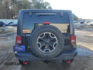 2016 Jeep Wrangler Unlimited Rubicon with VIN 1C4HJWFG9GL220687, listed as a Copart auction lot 48545685 with 49,474 mi miles and Salvage Title. Bid and sale history available at carsss.com. Image 6.