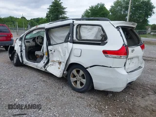 2011 Toyota Sienna LE AAS with VIN 5TDKK3DC6BS091557, listed as a IAAI auction lot 42170157 with 398,019 mi miles and . Bid and sale history available at DreamBid. Image 3.