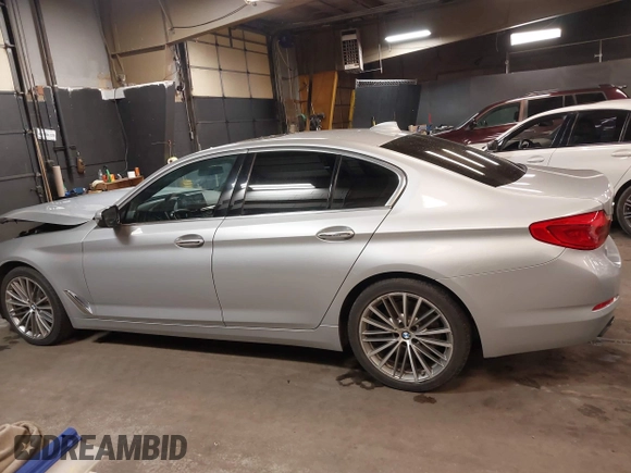 2018 BMW 5 Series 540i xDrive with VIN WBAJE7C53JWD52669, listed as a IAAI auction lot 41634800 with 89,829 mi miles and . Bid and sale history available at DreamBid. Image 14.