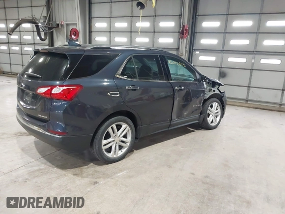 2019 Chevrolet Equinox Premier z VIN 3GNAXNEVXKS500672, wystawiony jako IAAI lot #42042922 z przebiegiem 77 440 mil mil oraz . Historia ofert i sprzedaży dostępna na DreamBid. Obrazek 4.