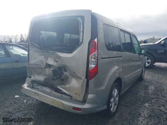 2015 Ford Transit Connect Wagon XLT with VIN NM0GE9F70F1196143, listed as a IAAI auction lot 41583712 with 112,722 mi miles. Bid and sale history available at carsss.com. Image 4.