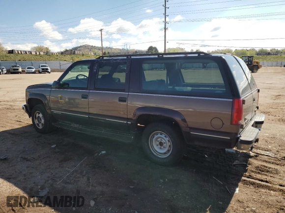 1997 GMC Suburban with VIN 3GKFK16R4VG518331, listed as a Copart auction lot 56241425 with 265,201 mi miles and Non repairable. Bid and sale history available at DreamBid. Image 2.