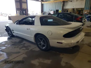 2001 Pontiac Firebird Formula z VIN 2G2FV22G212134322, wystawiony jako Copart lot #70813194 z przebiegiem Nie podano mil oraz Szkody całkowita. Historia ofert i sprzedaży dostępna na DreamBid. Obrazek 2.
