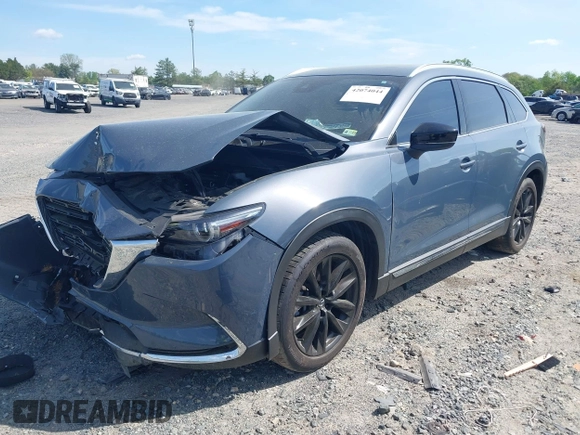 2022 Mazda CX-9 Grand Touring with VIN JM3TCBDY8N0628886, listed as a IAAI auction lot 42074044 with 67,867 mi miles and . Bid and sale history available at DreamBid. Image 2.