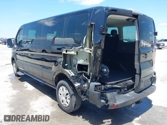 2020 Ford Transit Passenger XL z VIN 1FBAX2YG0LKA55428, wystawiony jako IAAI lot #42356622 z przebiegiem 89 748 mil mil oraz . Historia ofert i sprzedaży dostępna na DreamBid. Obrazek 3.