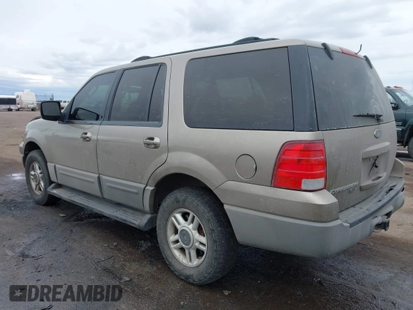 2003 Ford Expedition XLT Value z VIN 1FMPU16W83LA24310, wystawiony jako IAAI lot #41655746 z przebiegiem 201 482 mil mil oraz . Historia ofert i sprzedaży dostępna na DreamBid. Obrazek 3.