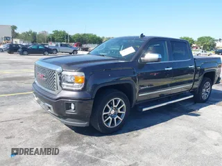 2015 GMC Sierra 1500 Denali with VIN 3GTU2WEC2FG422289, listed as a IAAI auction lot 42023170 with 165,856 mi miles and . Bid and sale history available at DreamBid. Image 2.
