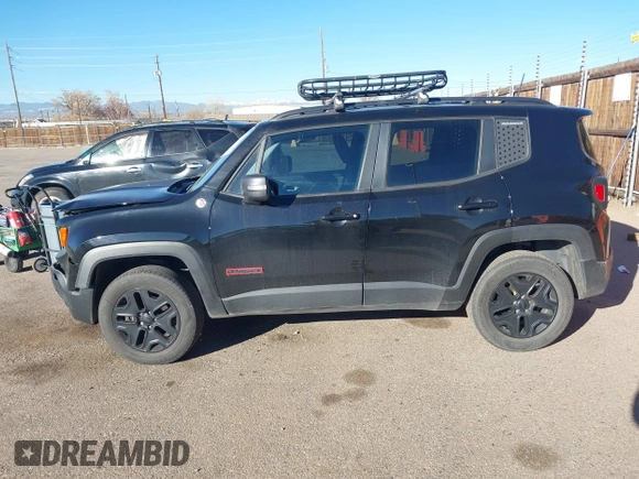 2018 Jeep Renegade Trailhawk with VIN ZACCJBCB4JPJ00887, listed as a IAAI auction lot 40981104 with 99,983 mi miles. Bid and sale history available at carsss.com. Image 14.
