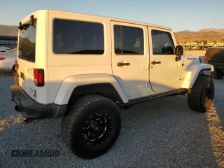 2015 Jeep Wrangler Unlimited Rubicon with VIN 1C4BJWFG5FL659017, listed as a Copart auction lot 84435034 with 69,915 mi miles and Salvage Title. Bid and sale history available at carsss.com. Image 3.