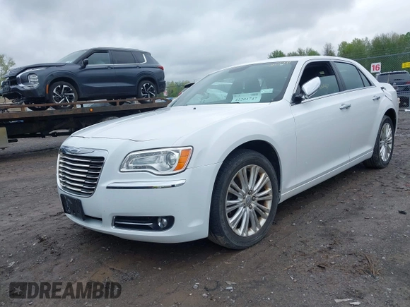 2014 Chrysler 300 C with VIN 2C3CCAKG5EH200996, listed as a IAAI auction lot 42201747 with 156,121 mi miles and . Bid and sale history available at carsss.com. Image 2.