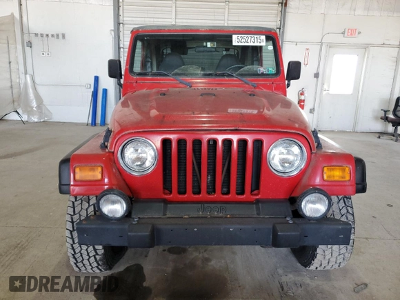 2000 Jeep Wrangler Sport with VIN 1J4FA49S9YP751596, listed as a Copart auction lot 52527315 with 132,514 mi miles and Clean Title. Bid and sale history available at carsss.com. Image 5.