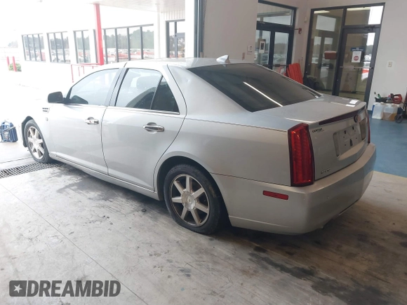 2011 Cadillac STS RWD with VIN 1G6DW6ED4B0120517, listed as a IAAI auction lot 41765069 with 120,059 mi miles and . Bid and sale history available at DreamBid. Image 3.