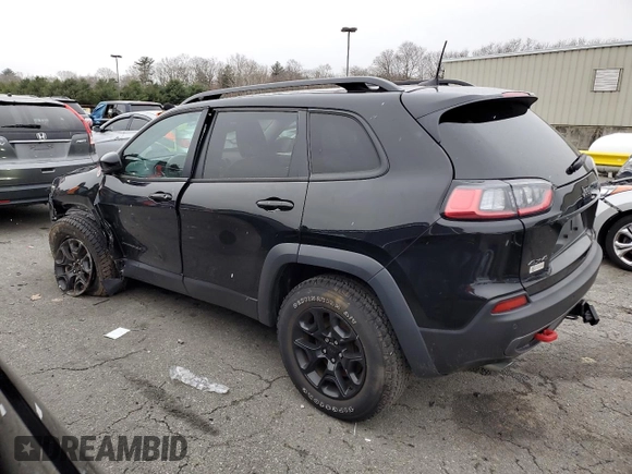 2022 Jeep Cherokee Trailhawk with VIN 1C4PJMBX3ND502322, listed as a Copart auction lot 85561444 with 57,630 mi miles and Salvage Title. Bid and sale history available at carsss.com. Image 2.