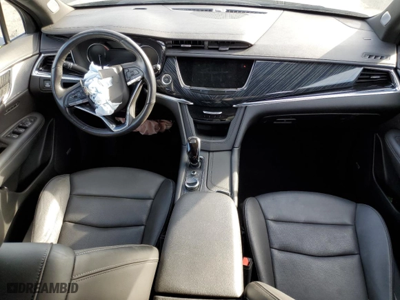 2023 Cadillac XT6 FWD Premium Luxury with VIN 1GYKPCRS5PZ200527, listed as a Copart auction lot 82838044 with 45,015 mi miles and Salvage Title. Bid and sale history available at carsss.com. Image 8.