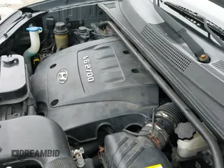 2007 Hyundai Tucson SE with VIN KM8JN12D37U666151, listed as a IAAI auction lot 43349229 with 185,269 mi miles and . Bid and sale history available at DreamBid. Image 12.