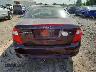 2012 Ford Fusion SE z VIN 3FAHP0HA7CR387524, wystawiony jako Copart lot #62083235 z przebiegiem 104 698 mil mil oraz Szkoda całkowita • Salvage title. Historia ofert i sprzedaży dostępna na DreamBid. Obrazek 6.