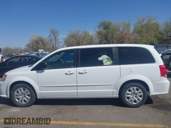 2017 Dodge Grand Caravan SE Plus z VIN 2C4RDGBG2HR741587, wystawiony jako IAAI lot #41965041 z przebiegiem 88 112 mil mil oraz . Historia ofert i sprzedaży dostępna na DreamBid. Obrazek 14.