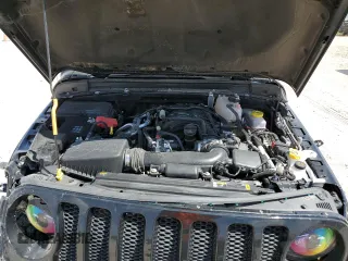 2023 Jeep Wrangler Sport with VIN 1C4HJXAG3PW672856, listed as a Copart auction lot 70444274 with 6,077 mi miles and Salvage title. Bid and sale history available at DreamBid. Image 12.