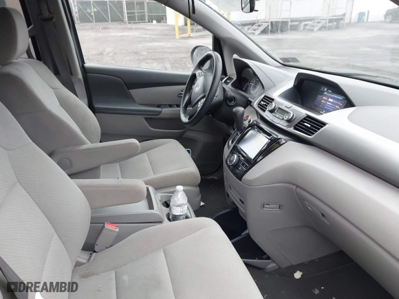 2016 Honda Odyssey SE with VIN 5FNRL5H3XGB150025, listed as a IAAI auction lot 41857704 with 69,515 mi miles. Bid and sale history available at carsss.com. Image 5.