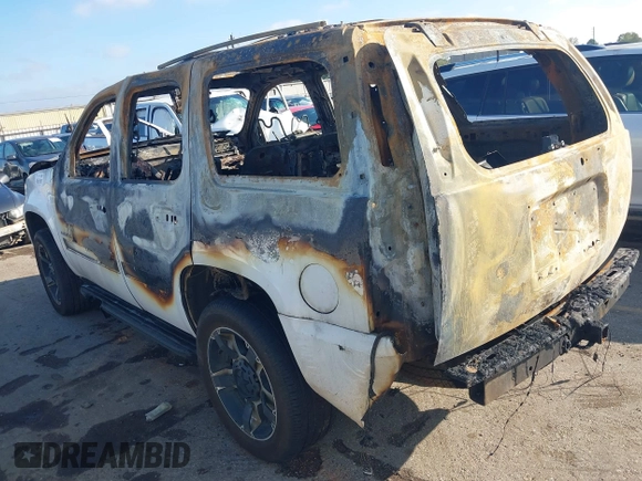 2014 Chevrolet Tahoe LT with VIN 1GNSCBE00ER247632, listed as a IAAI auction lot 41051307 with Not provided miles and . Bid and sale history available at DreamBid. Image 3.